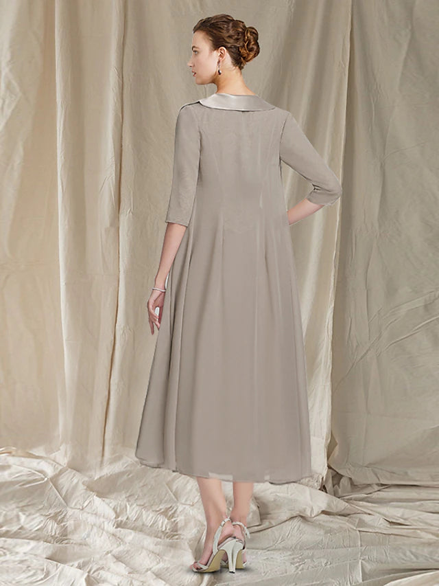 Back view of the tea-length A-line dress, showing the flow of the skirt.