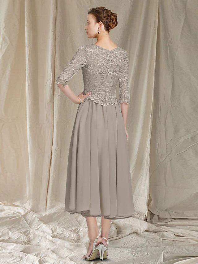 Side view of the Mother of the Bride dress, highlighting the jacket and silhouette.