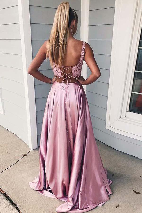 Full view of a candy pink two-piece A-line formal gown with V-neck.