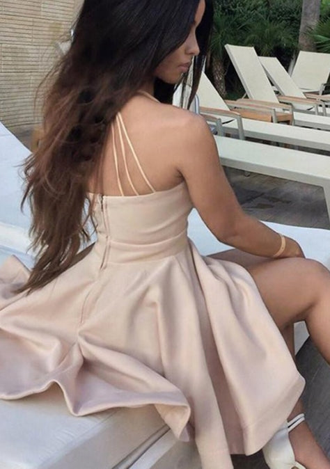 Back view of a woman wearing a chic V-neck A-line mini homecoming dress.
