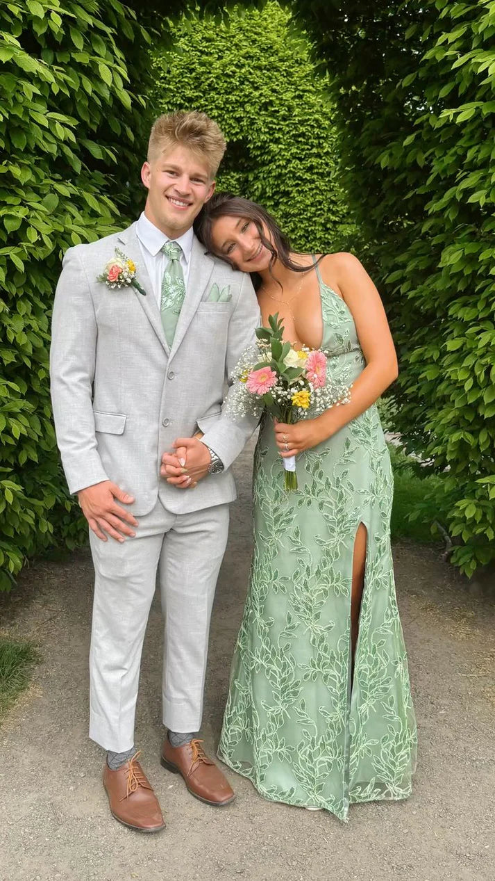Woman wearing a mint green sequin mermaid prom dress with spaghetti straps and a high leg split.