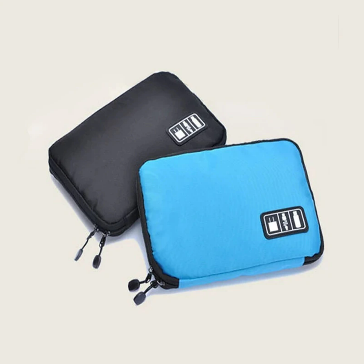 A black portable cable organizer bag, open, with a power bank and cables in compartments.