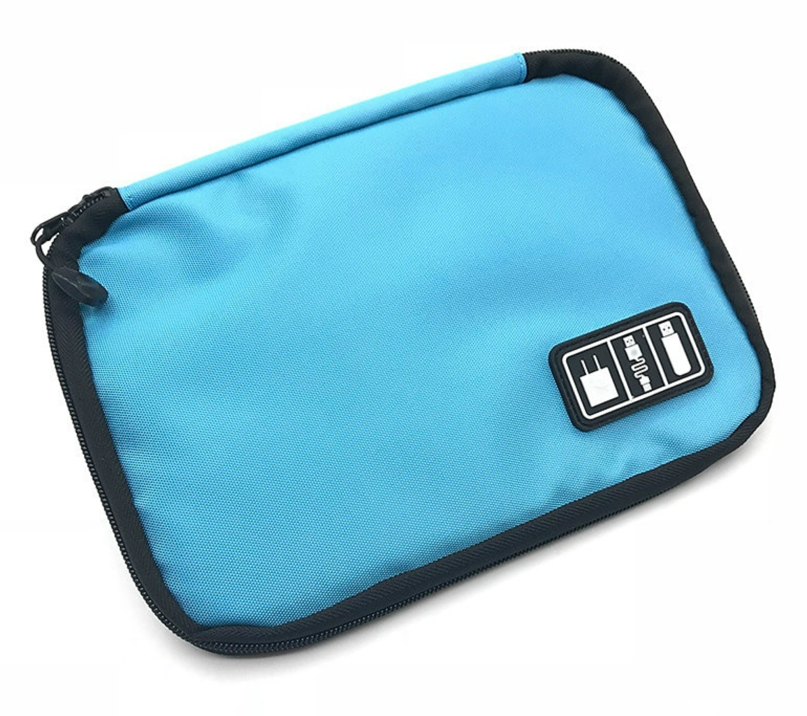 A blue portable cable organizer bag, closed, held in hand, demonstrating its portability.