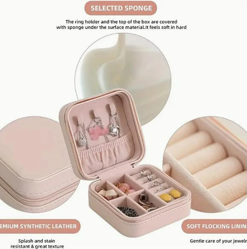 Side view of a pink travel jewelry storage box.