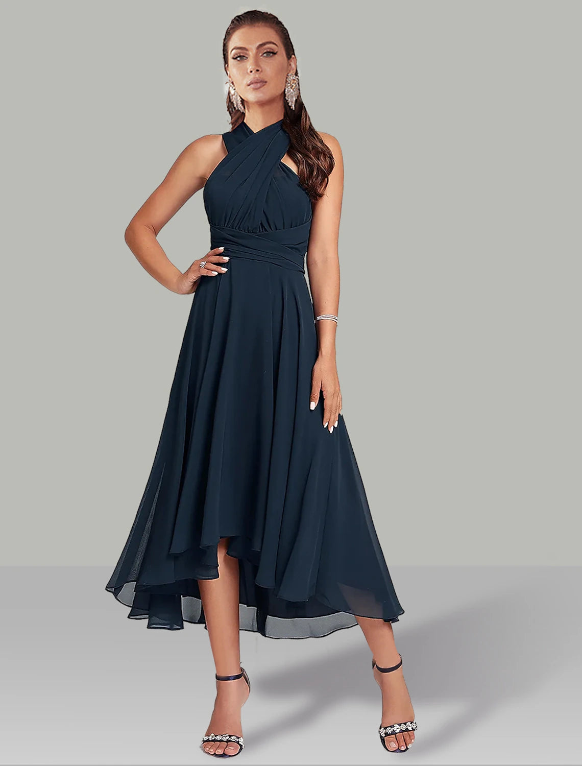 Back view of blue chiffon tea length formal dress.