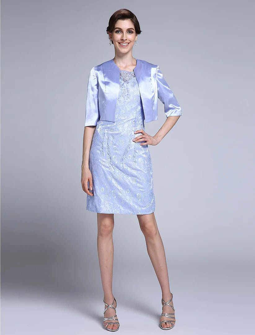 Woman wearing a convertible V-neck sheath Mother of the Bride dress with satin and lace details.