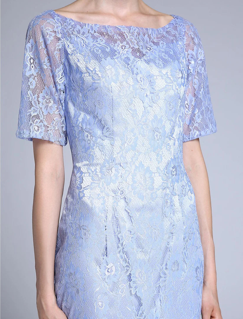 Side view of the woman in the knee-length convertible sheath dress.