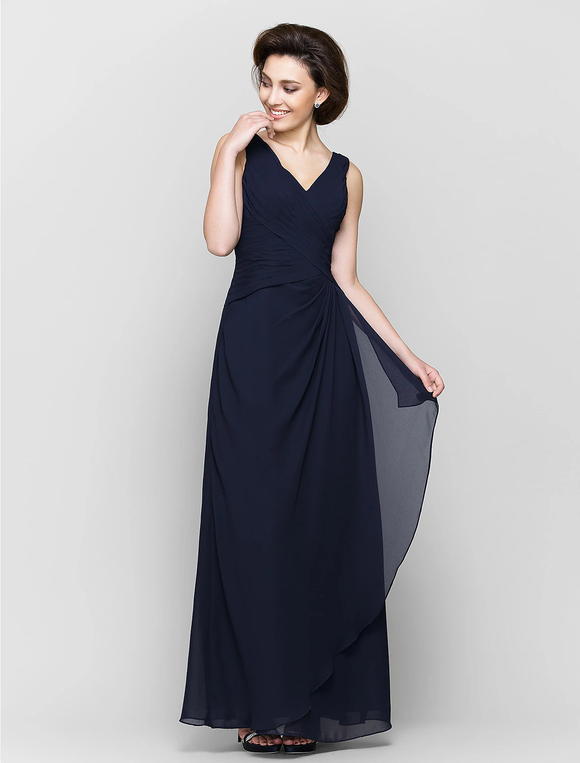 Woman modeling the convertible dress, showcasing its versatile styling.