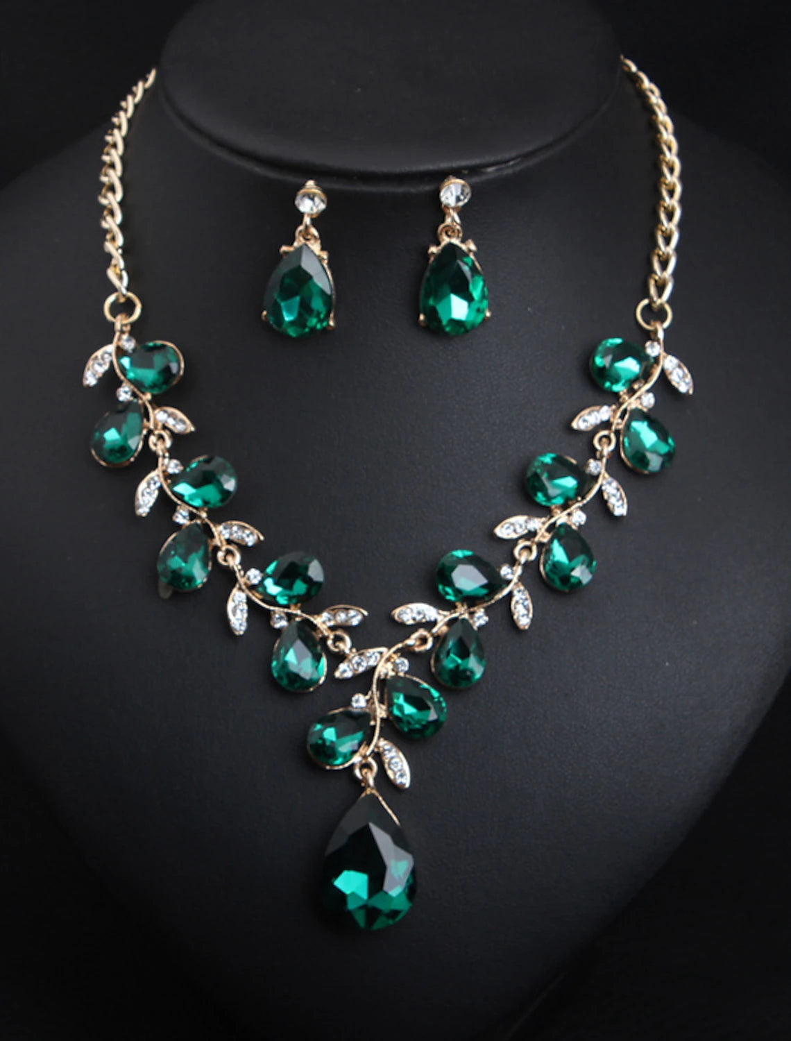 Crystal rhinestone floral necklace and matching earrings set.