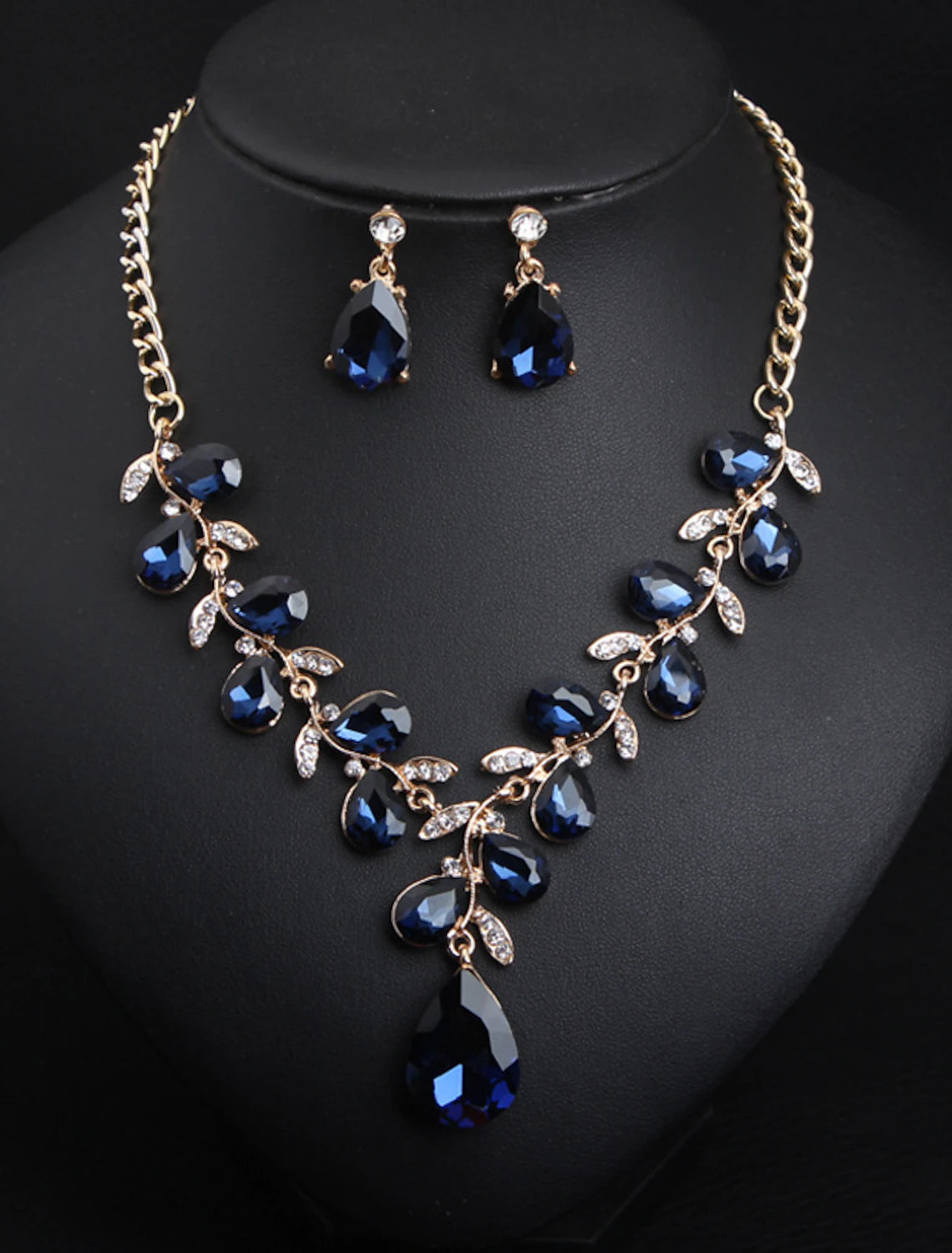 Elegant crystal rhinestone necklace with a detailed floral design.