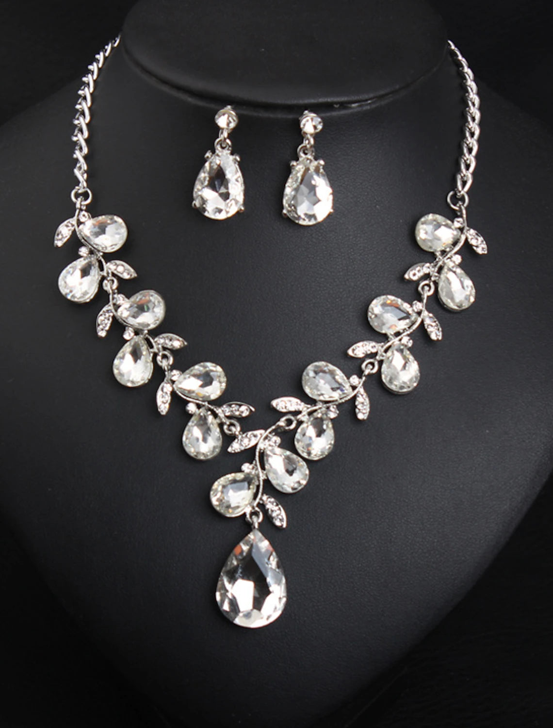 Full view of the crystal rhinestone bridal jewelry set, necklace and earrings.