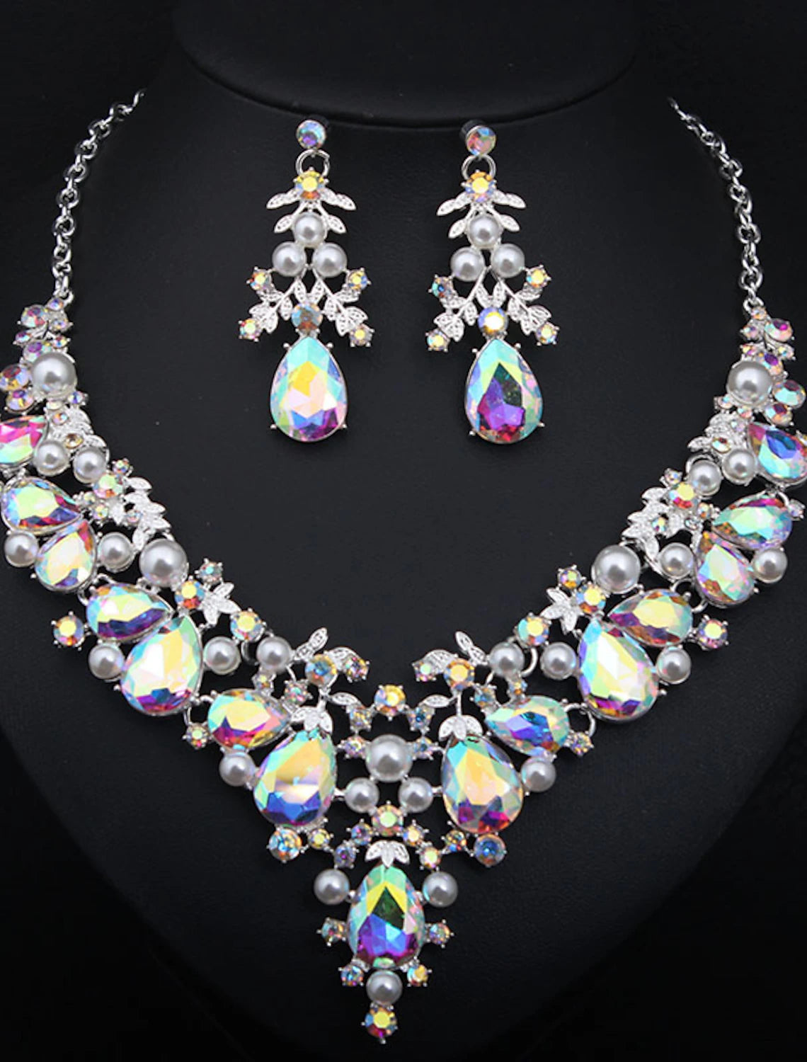 Close-up of crystal rhinestone flower necklace and earrings set.