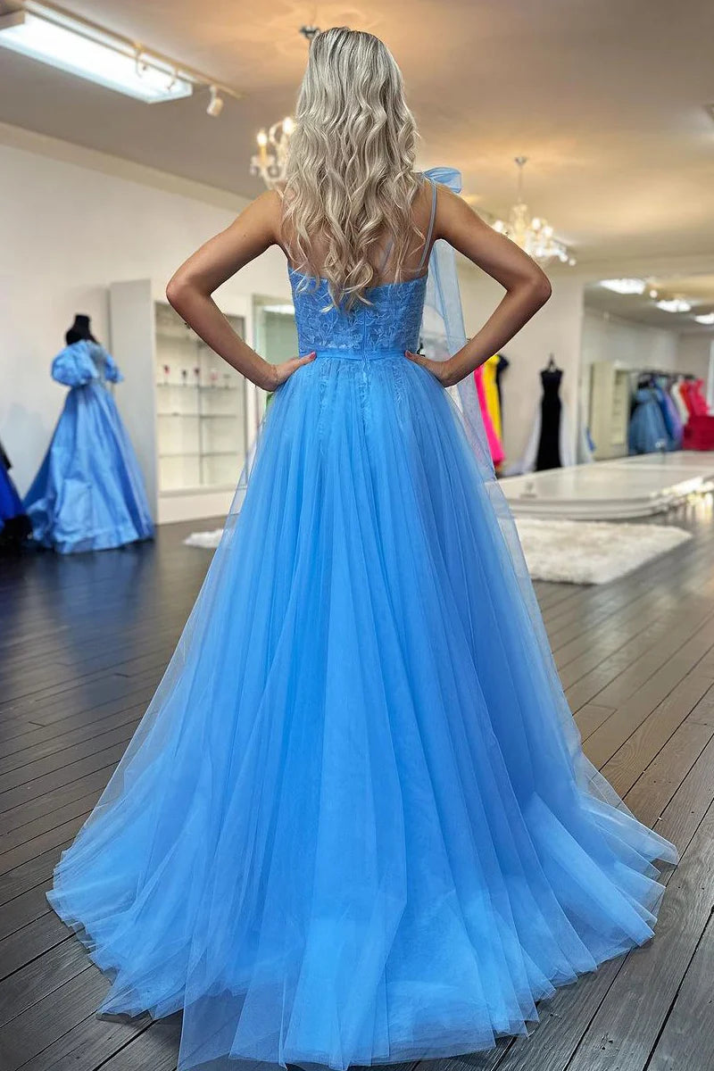 Blue tulle prom dress with delicate appliques.