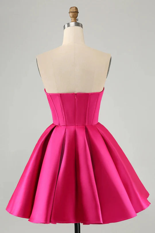 Side view of a model wearing a short A-line sweetheart corset homecoming dress with beading.