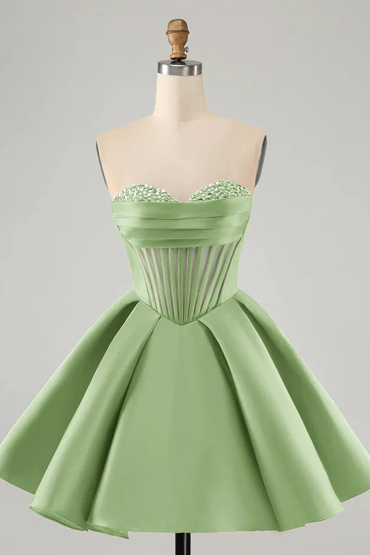 Close-up of the intricate beading detail on the sweetheart corset homecoming dress.