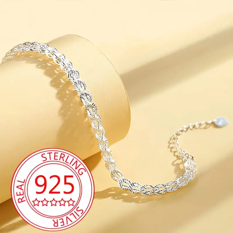 Close-up of the phoenix tail design on the 925 silver bracelet.