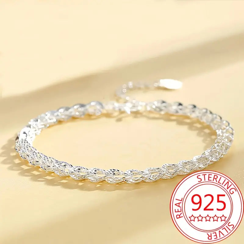 Detailed shot of the 925 sterling silver stamp on the bracelet.