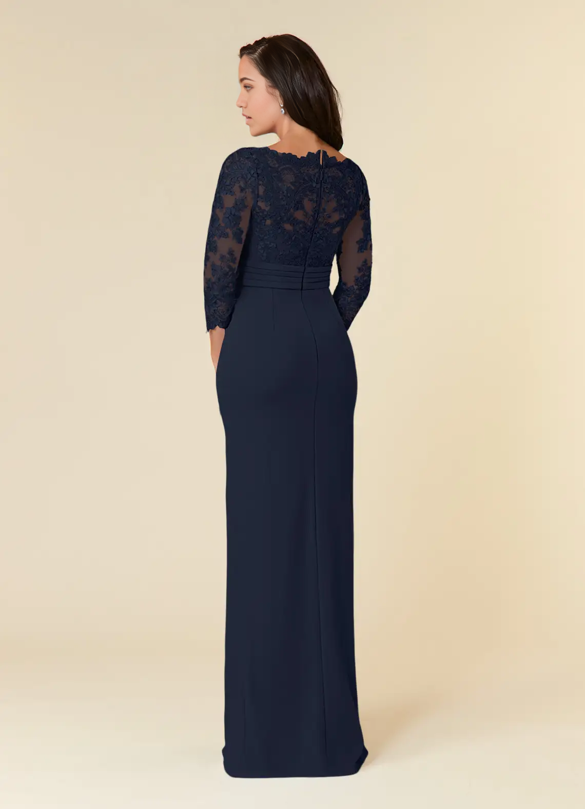 Back view of dark navy sheath formal dress with lace details.