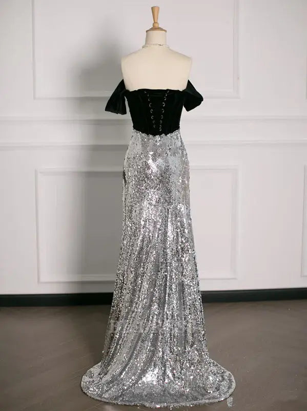 Elegant A-line sequin prom dress, side view.
