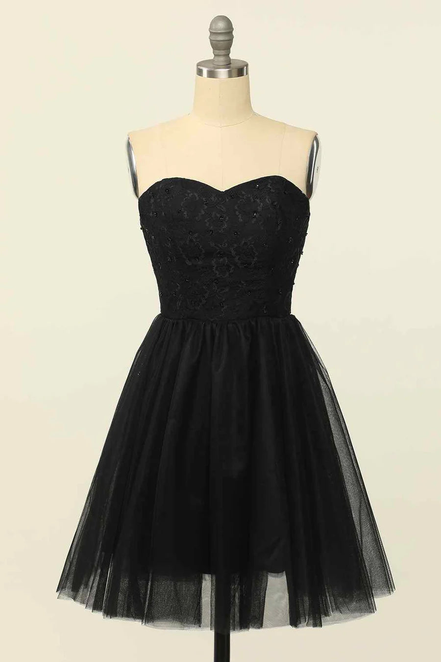 A-line strapless mini homecoming dress with lace and beading, front view.