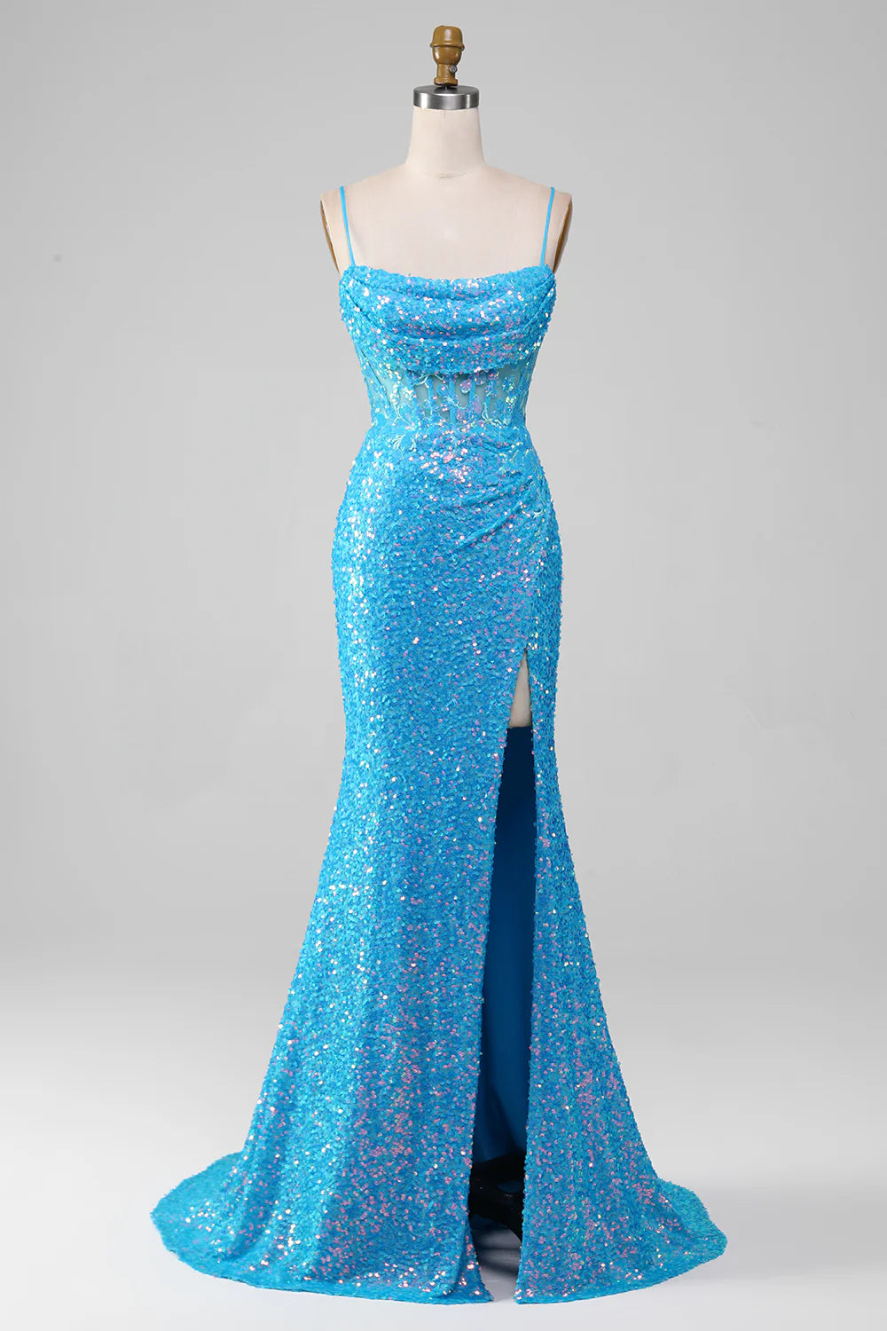 Blue sparkly A-line prom dress with spaghetti straps and high slit.