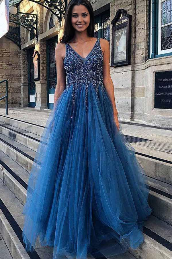 Side profile of the A-line V-neck prom dress, highlighting its flowing silhouette.