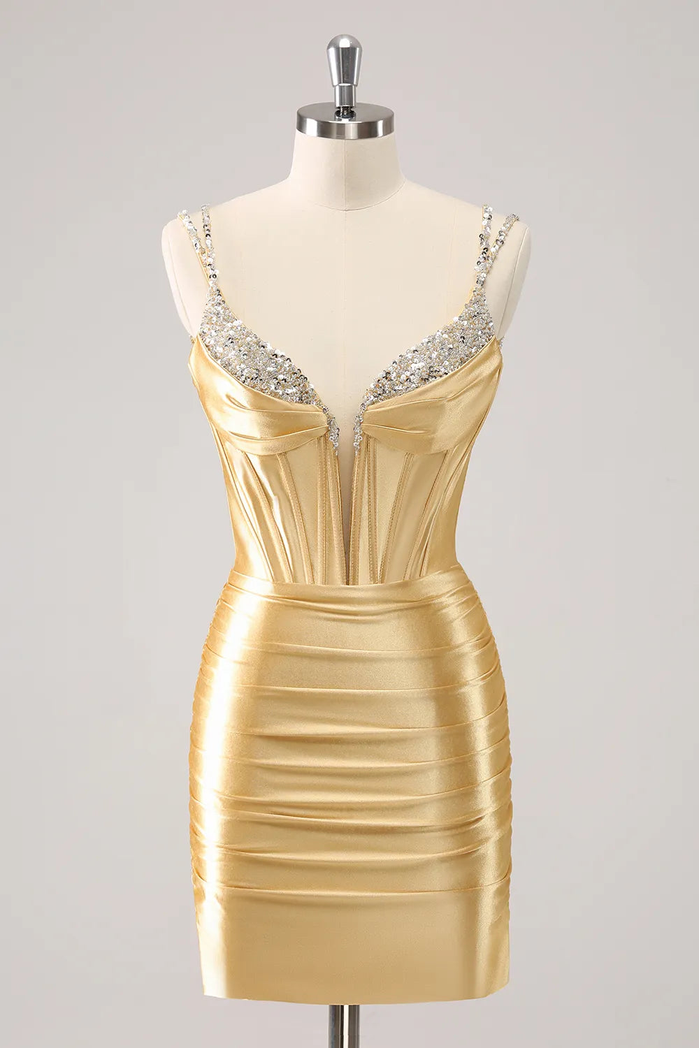 Model wearing a dazzling bodycon satin corset homecoming dress with intricate beading.