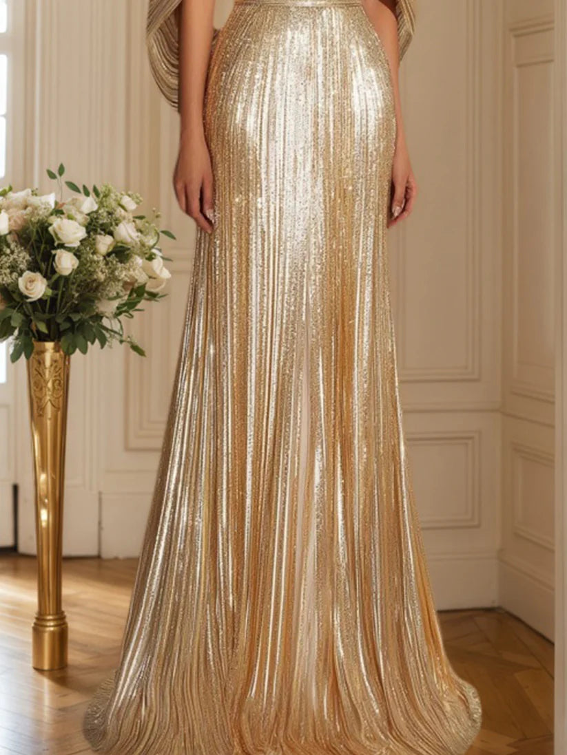 Back view of elegant gold V-neck cape maxi gown.