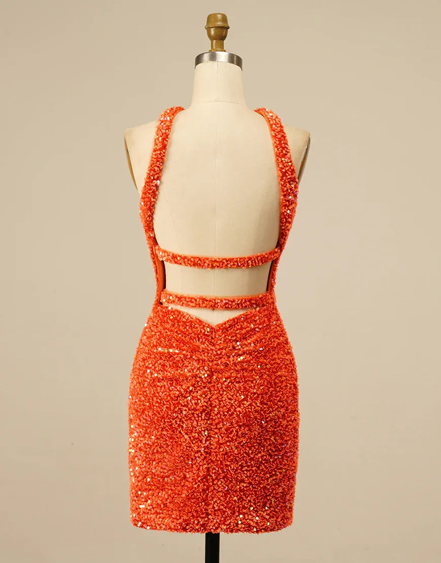 Back view of a model in a shimmering halter backless sequin dress.
