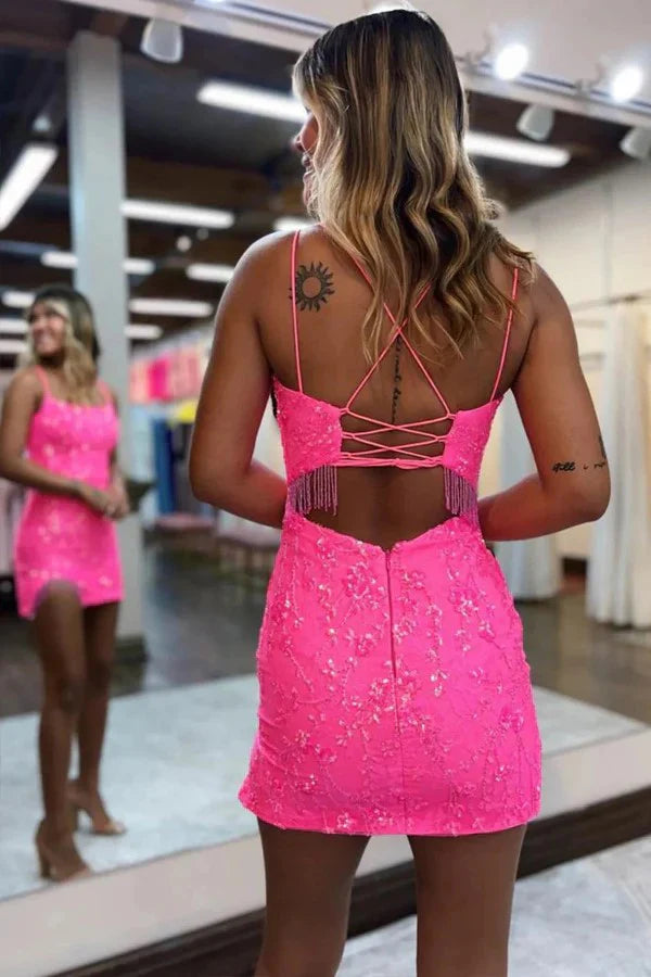 Back view of hot pink bodycon dress featuring delicate beading.