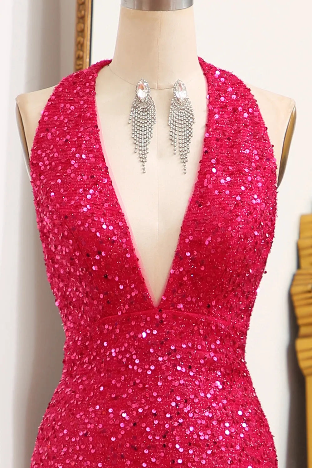 Mermaid silhouette prom dress with flowing split.