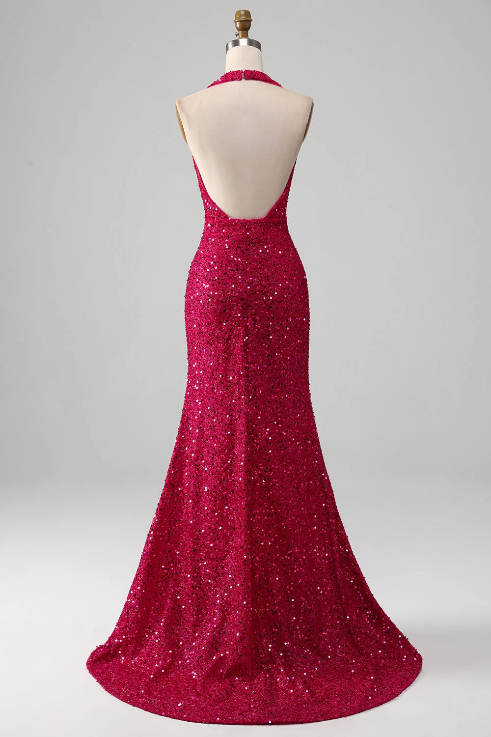 Back view of the fuchsia mermaid halter sequin prom dress.