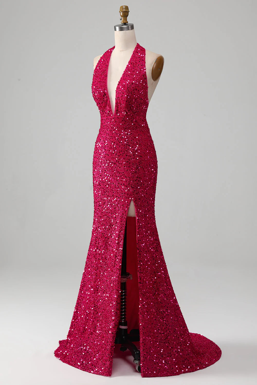 Close-up of the sequin detail on the fuchsia mermaid halter dress.