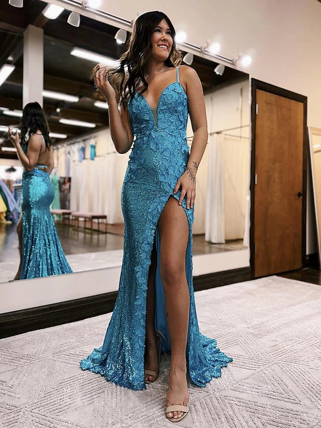 Elegant mermaid trumpet prom dress with V-neck and sequin appliques.