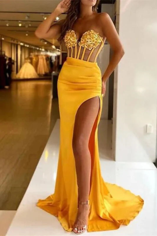 Elegant mermaid sequin prom dress with a V-neck and side split.