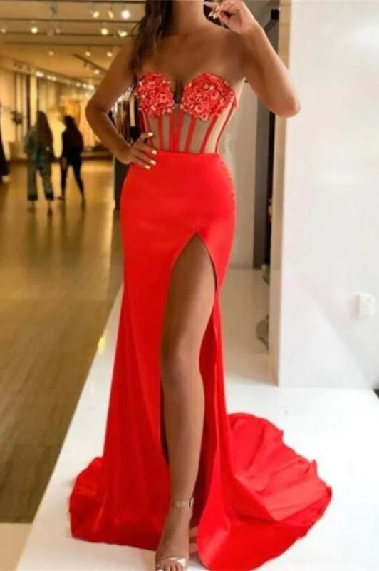 Sleeveless mermaid gown adorned with shimmering sequins and a flowing split.