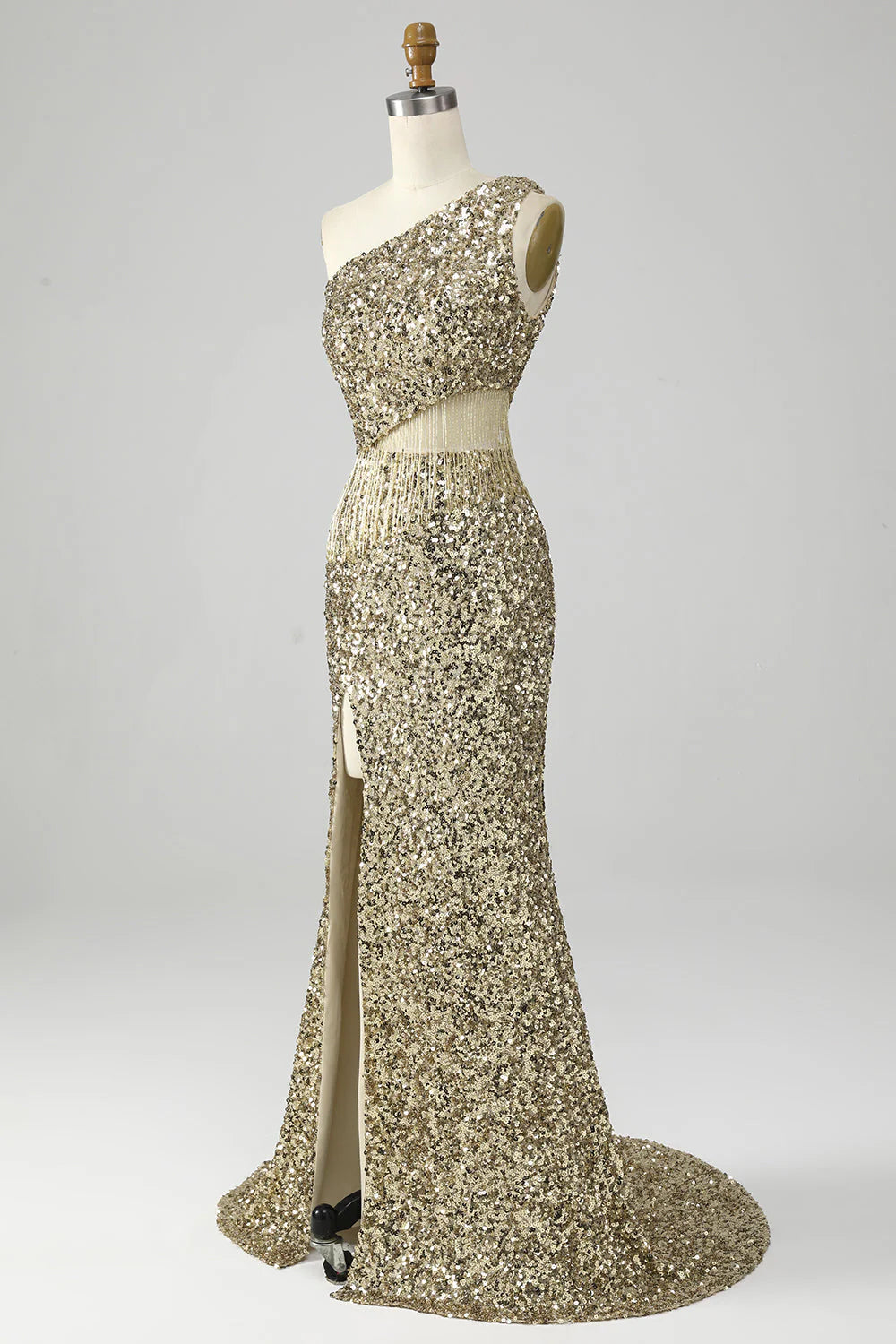 Full-length view of the golden one-shoulder prom dress, highlighting the elegant slit.