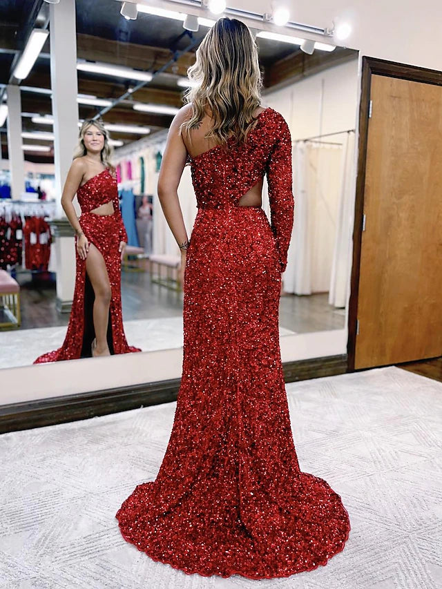 Back view of the glamorous backless sequined mermaid dress with a court train.