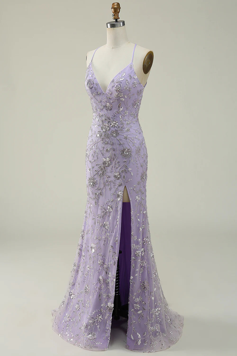 Back view of the purple sequin mermaid dress, highlighting the intricate sequin detailing.