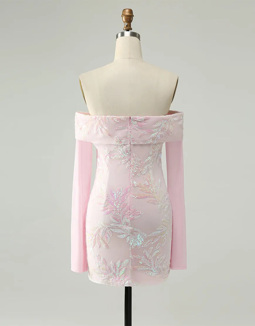 Close-up of the sequined embroidery and off-the-shoulder neckline of the pink dress.