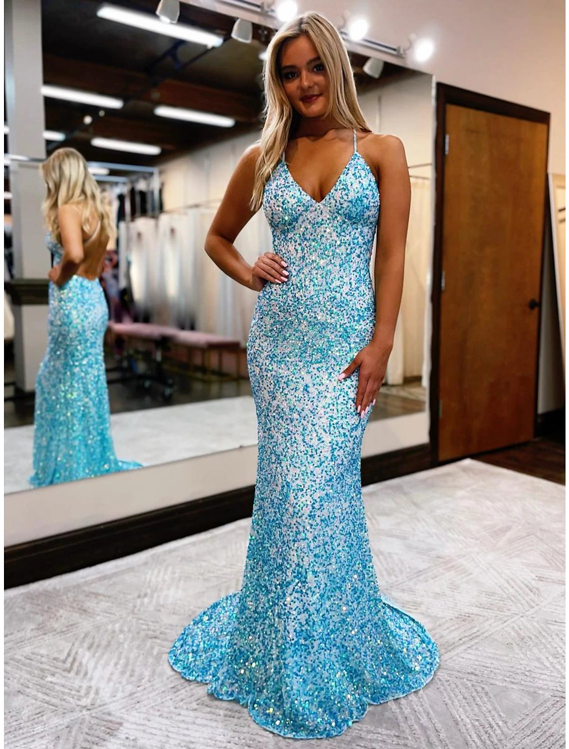 Front view of a dazzling sequined mermaid prom dress with V-neck.