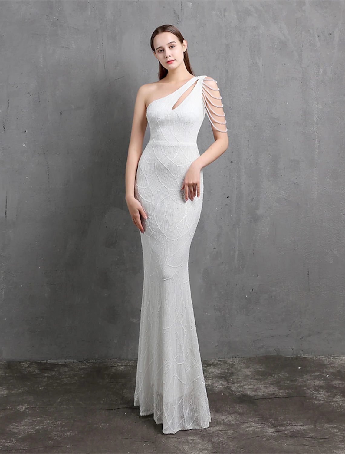 Dazzling sequined mermaid trumpet evening gown with one shoulder design.