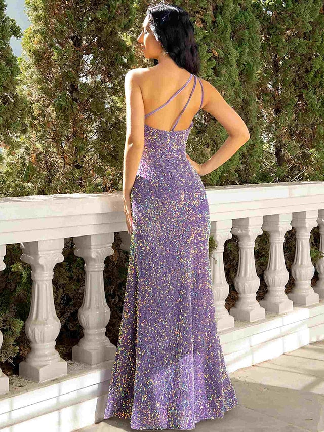 Side view of sequined one-shoulder dress with high slit.
