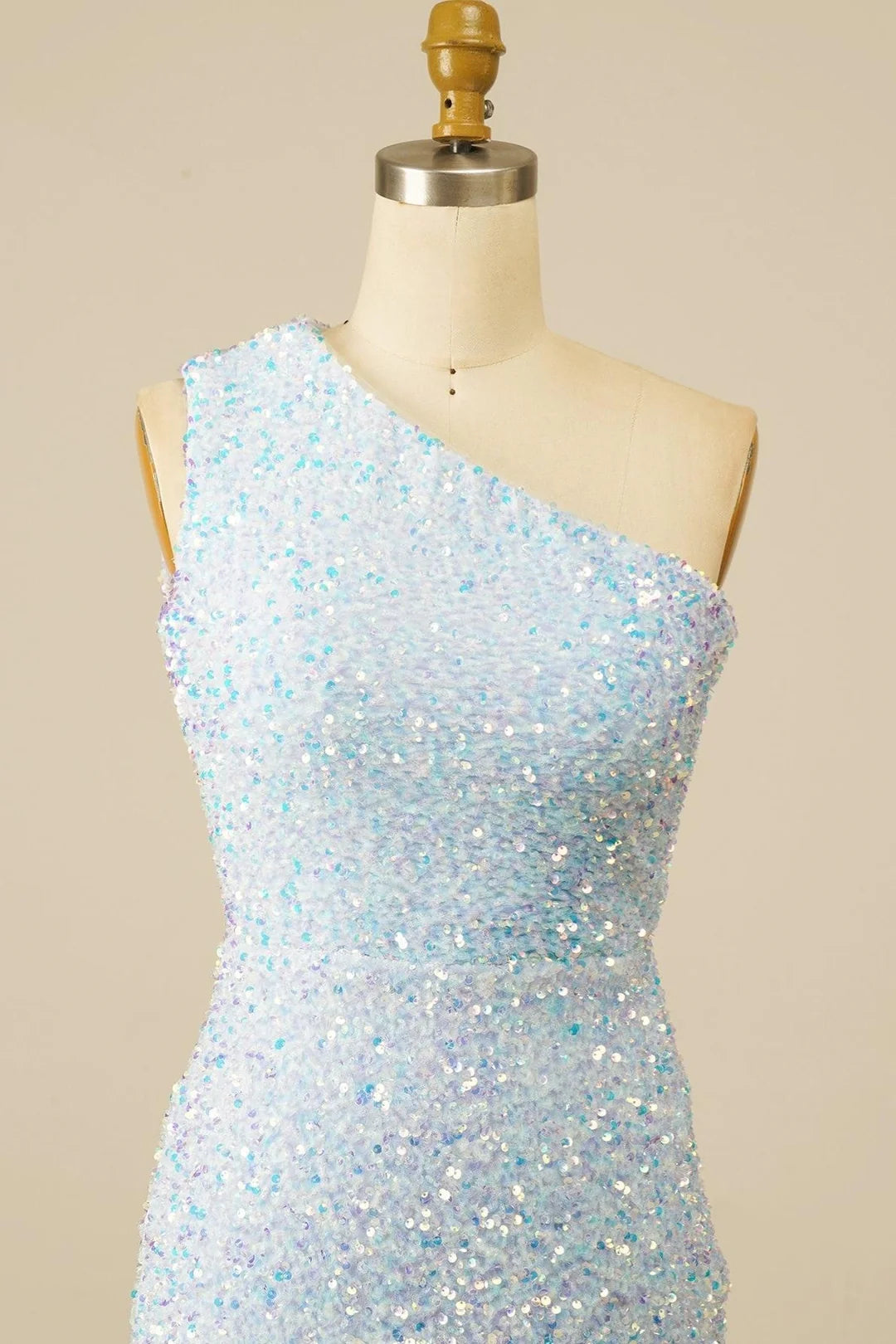 Full length view of a model wearing the sequin one-shoulder homecoming dress.