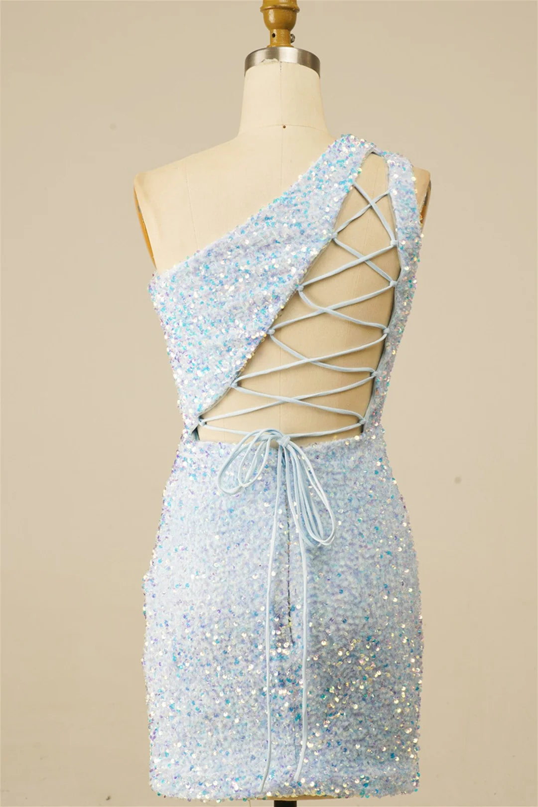 Detailed view of the lace-up back on the sequin sheath dress.