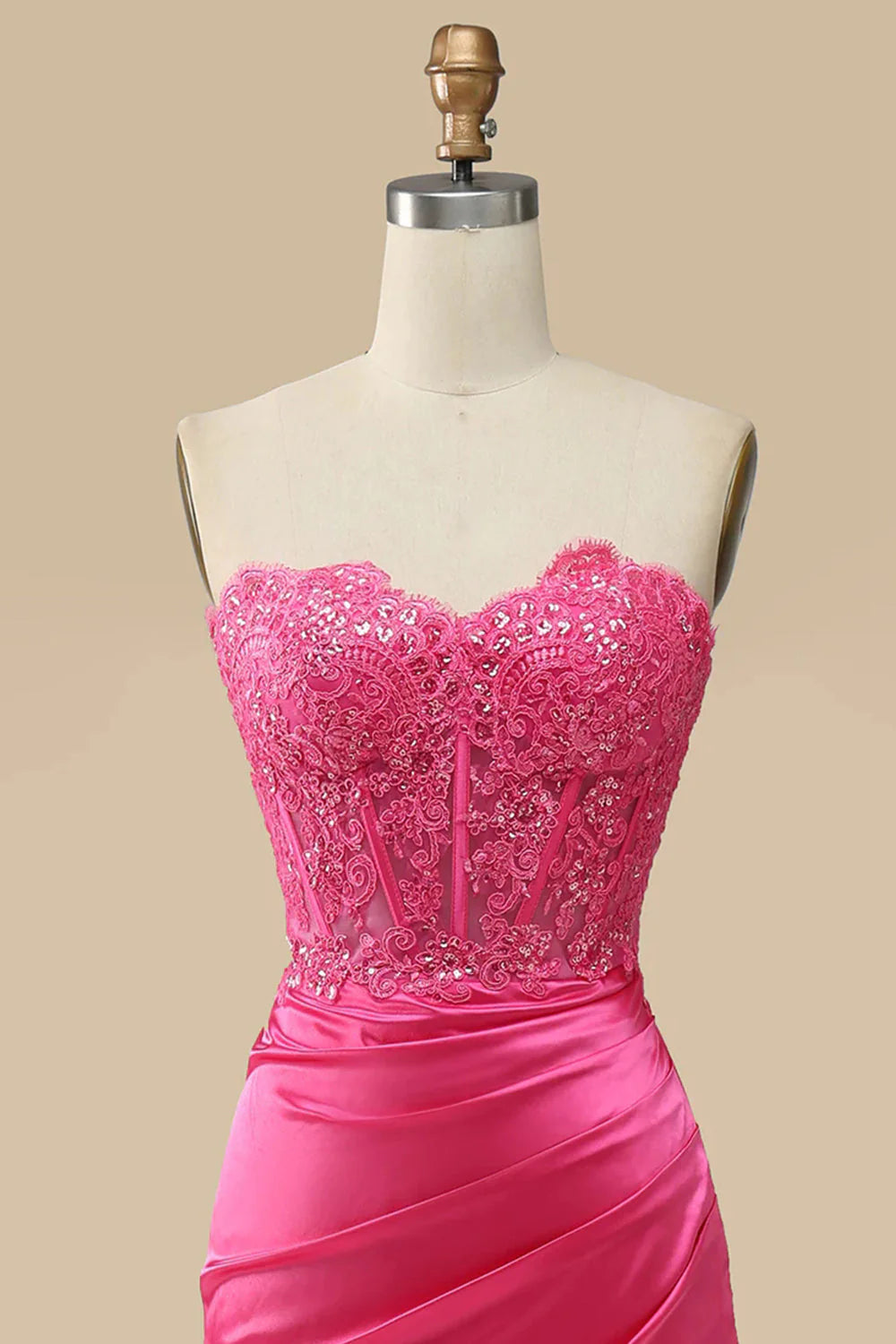 Back view of the sparkly prom dress, showing the intricate corset lacing.