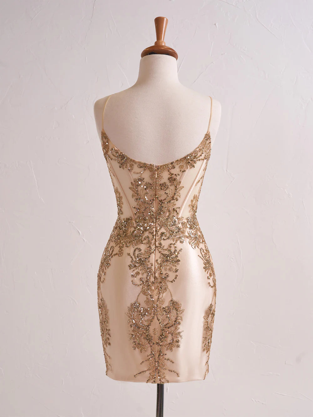 Close-up of the sequin and sheer details on the corset prom dress.