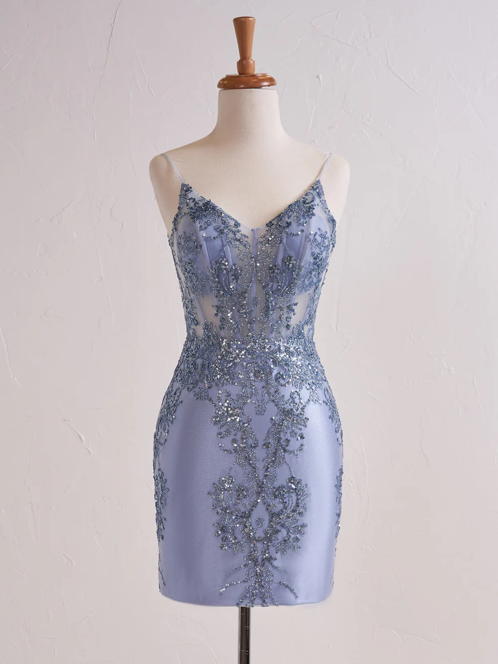 Side view of the model in the elegant short sequin party dress.