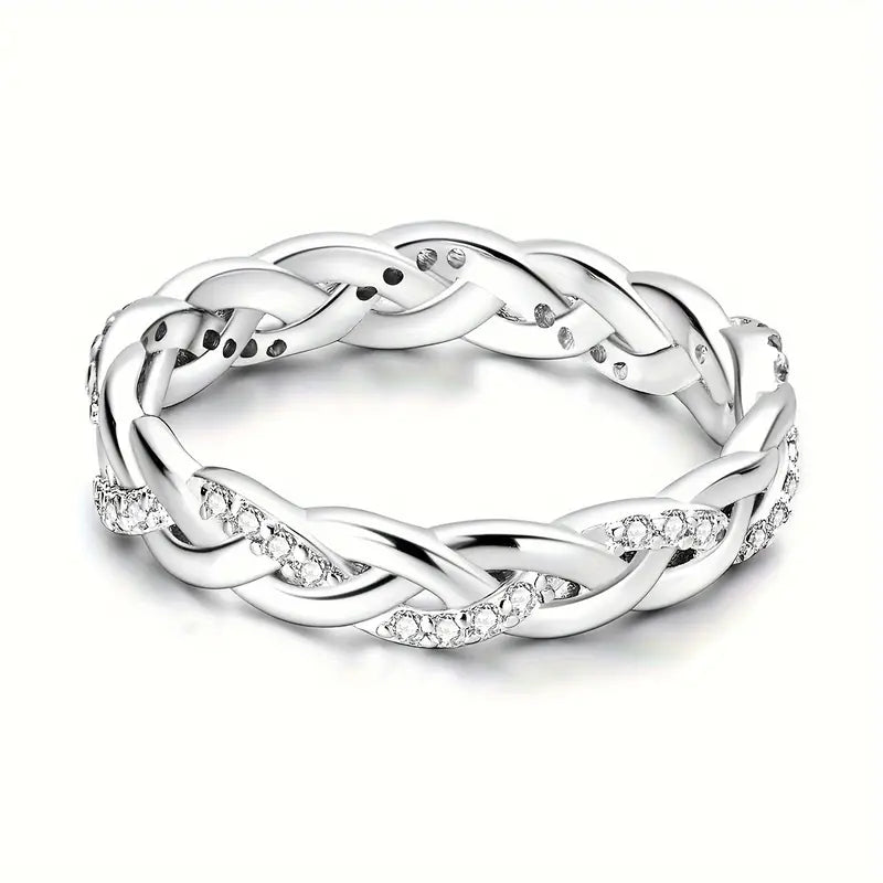 925 sterling silver ring with sparkling zirconia on a hand.