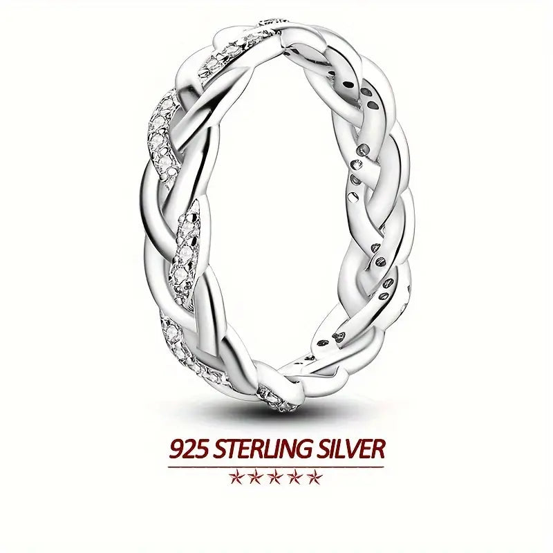 Side view of a stackable 925 sterling silver ring with zirconia.